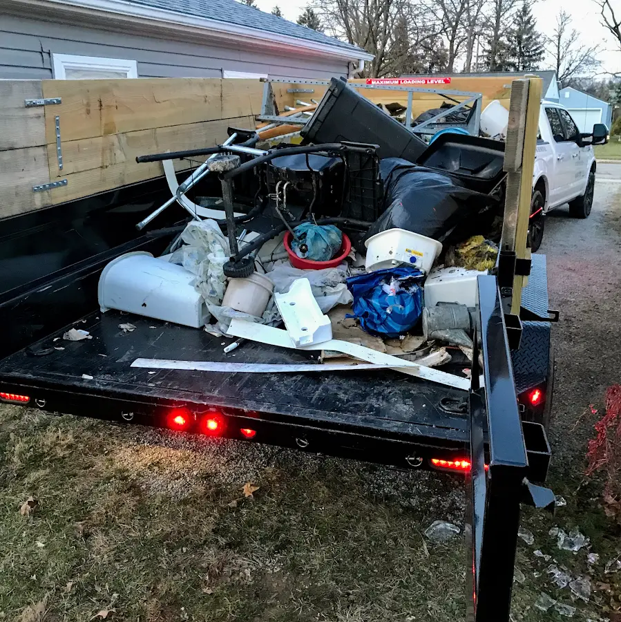 Roll-off dumpster delivered to a residential driveway in Amory