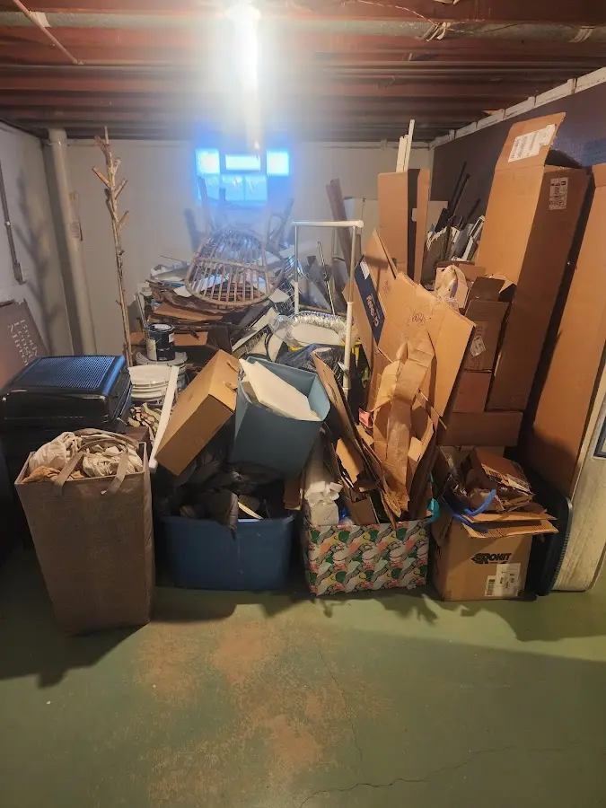 Roll-off dumpster container at job site for 2 Yard Dumpster Rental in Amory